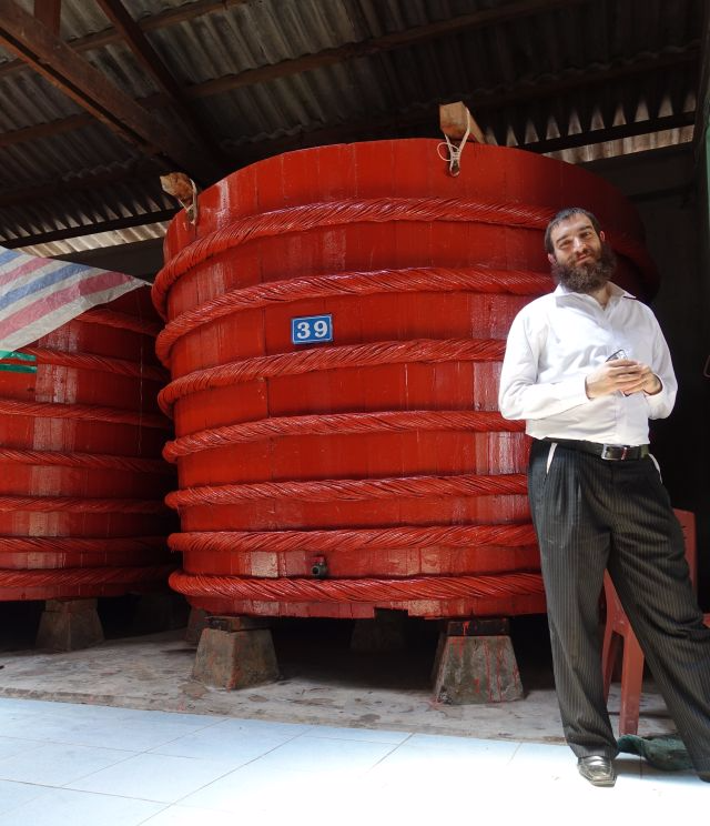 Red boat fish sauce Rabbi Hartman standing