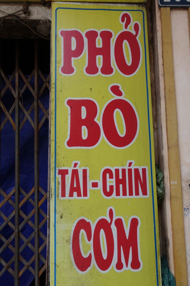 Vietnamese restaurant sign of pho and rice
