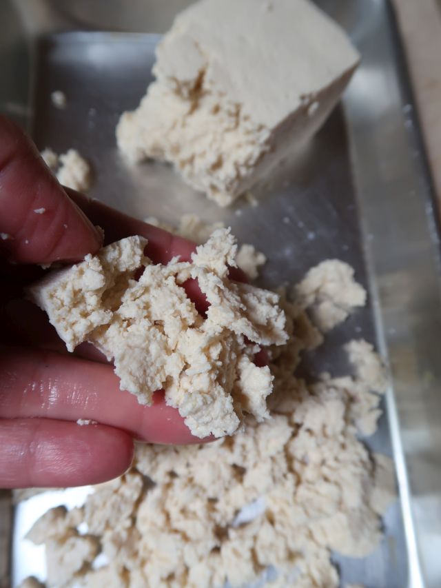 Crumble thawed tofu