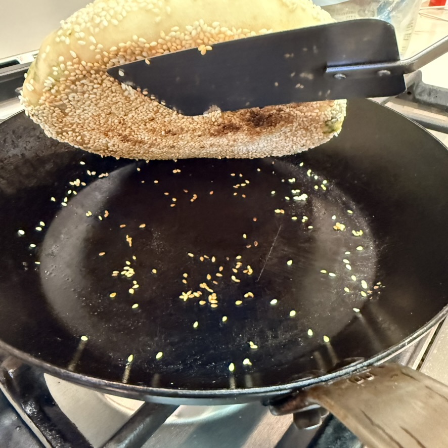 sesame scallion bread cooking