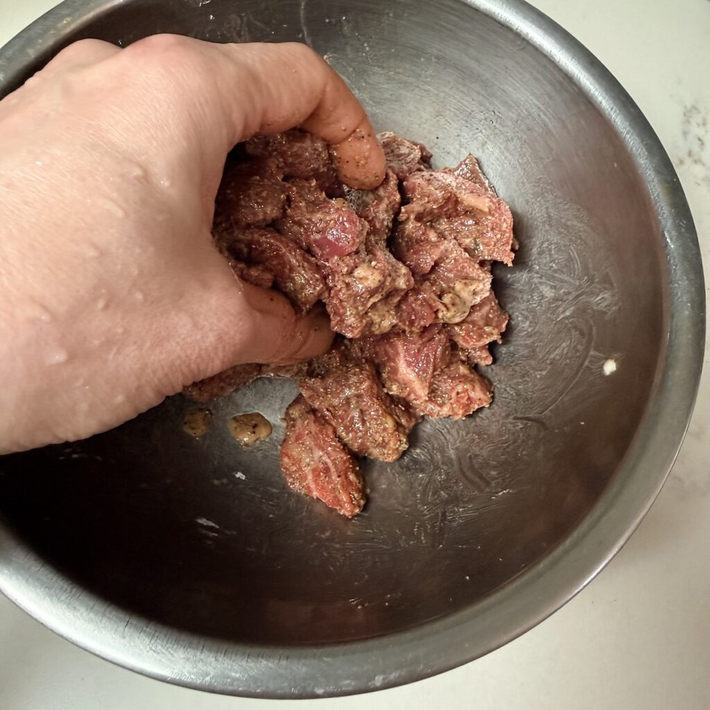 stir-fried beef and collard greens marinating beef