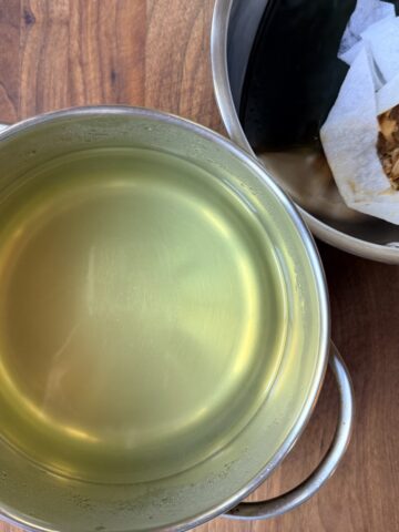 dashi stock with kombu and dried bonito flakes (katsuobushi)