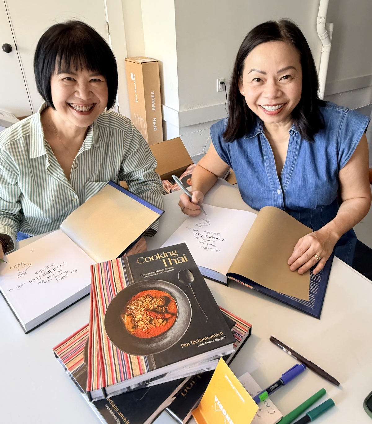 Andrea and Pim signing Cooking Thai